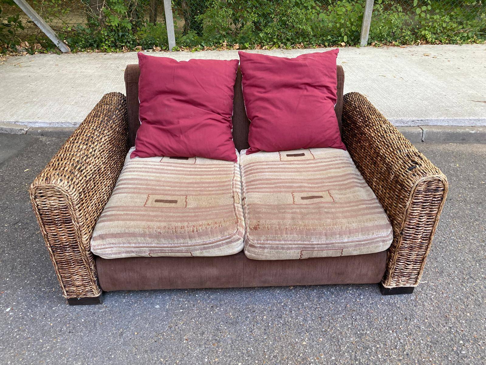 Exotic 2-seater sofa in woven banana tree / rattan and brown fabric.