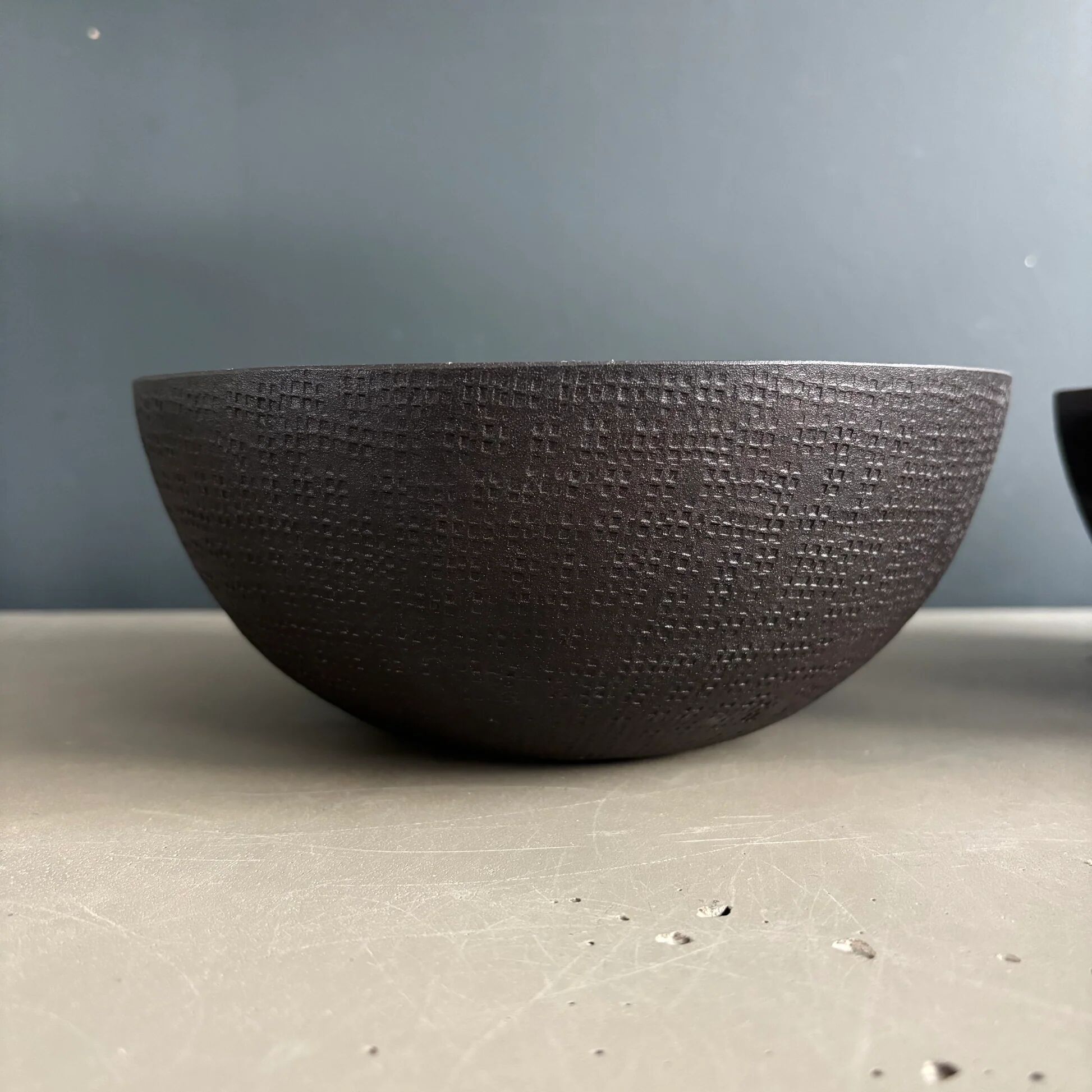 Pair of black lacquered metal catchall bowls