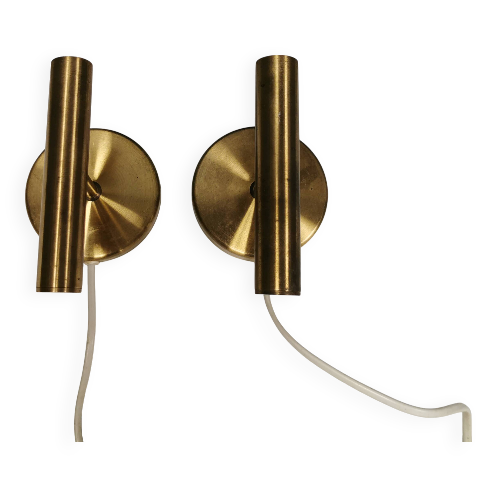 A set of stylish brass wall lamps from Danish Darø