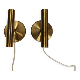 A set of stylish brass wall lamps from Danish Darø