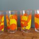 Verres vintage décorated with orange and yellow lemon fruits, Italy.