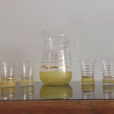 Old pitcher with its 8 yellow granite glasses with gold edging vintage 50's