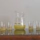 Old pitcher with its 8 yellow granite glasses with gold edging vintage 50's