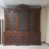 Glass-fronted walnut bookcase