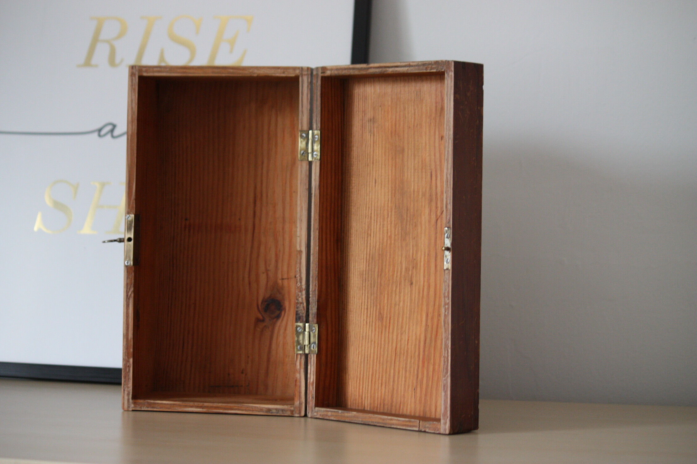 Carved wooden box with lock