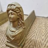Cast iron andirons heads of women