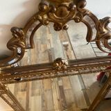 Antique mirror with gilded pediment from Maison Deknudt