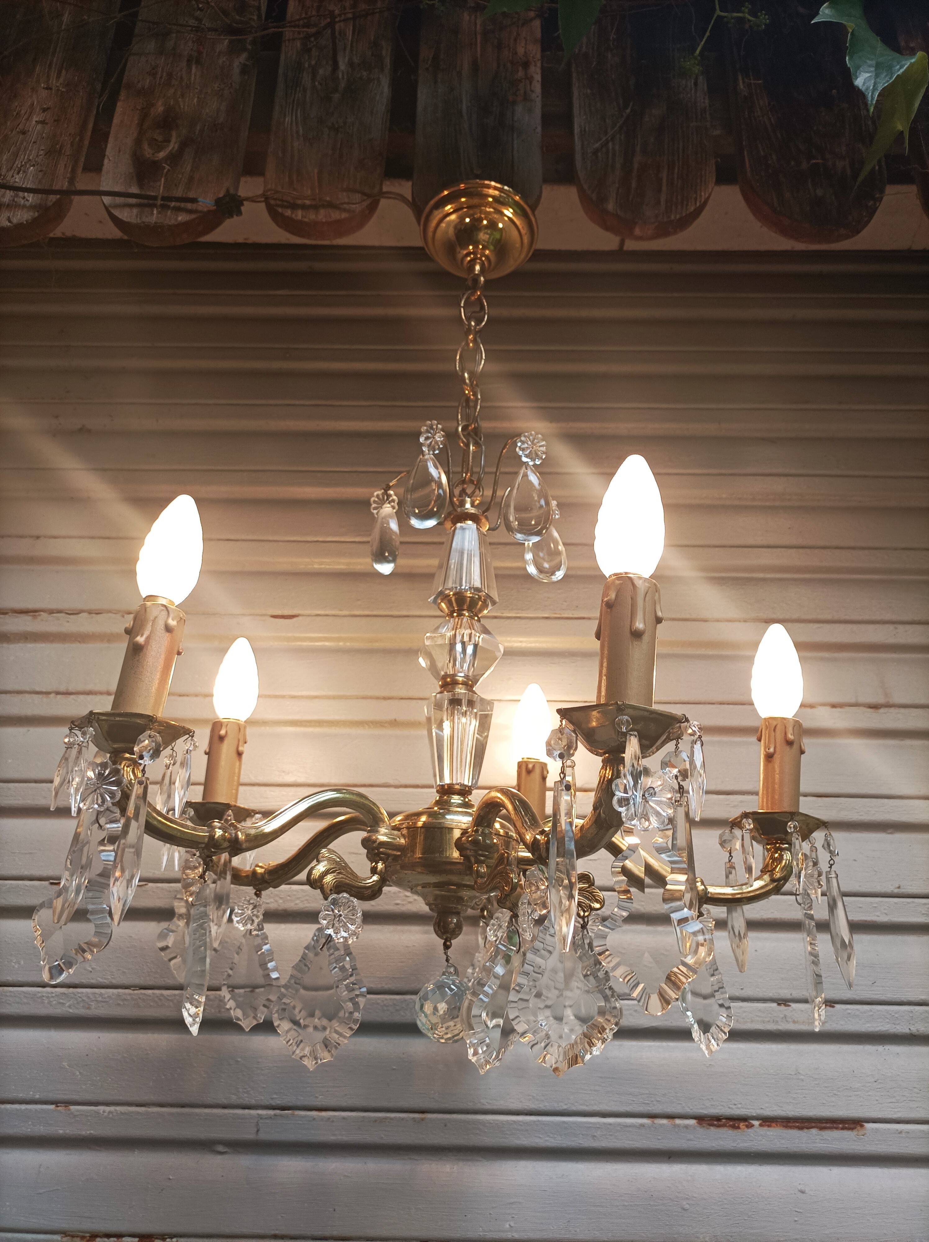 Exceptional bronze chandelier with crystal pendants in working order circa 1910
