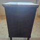 Antique Empire-style bedside table with marble top.