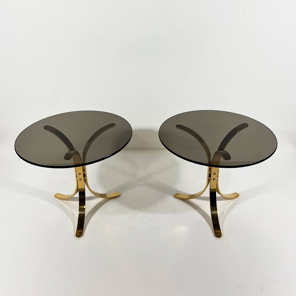 Brass and smoked glass side tables from the 1960s.