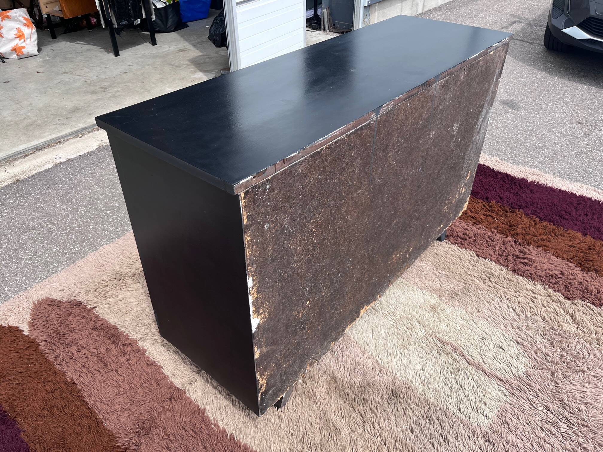 black and wood two-door sideboard