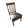 Chaise basse dorée