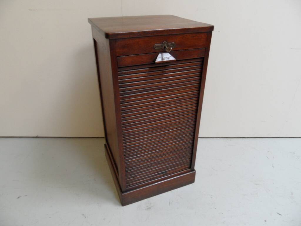 Antique filing cabinet with roller shutter