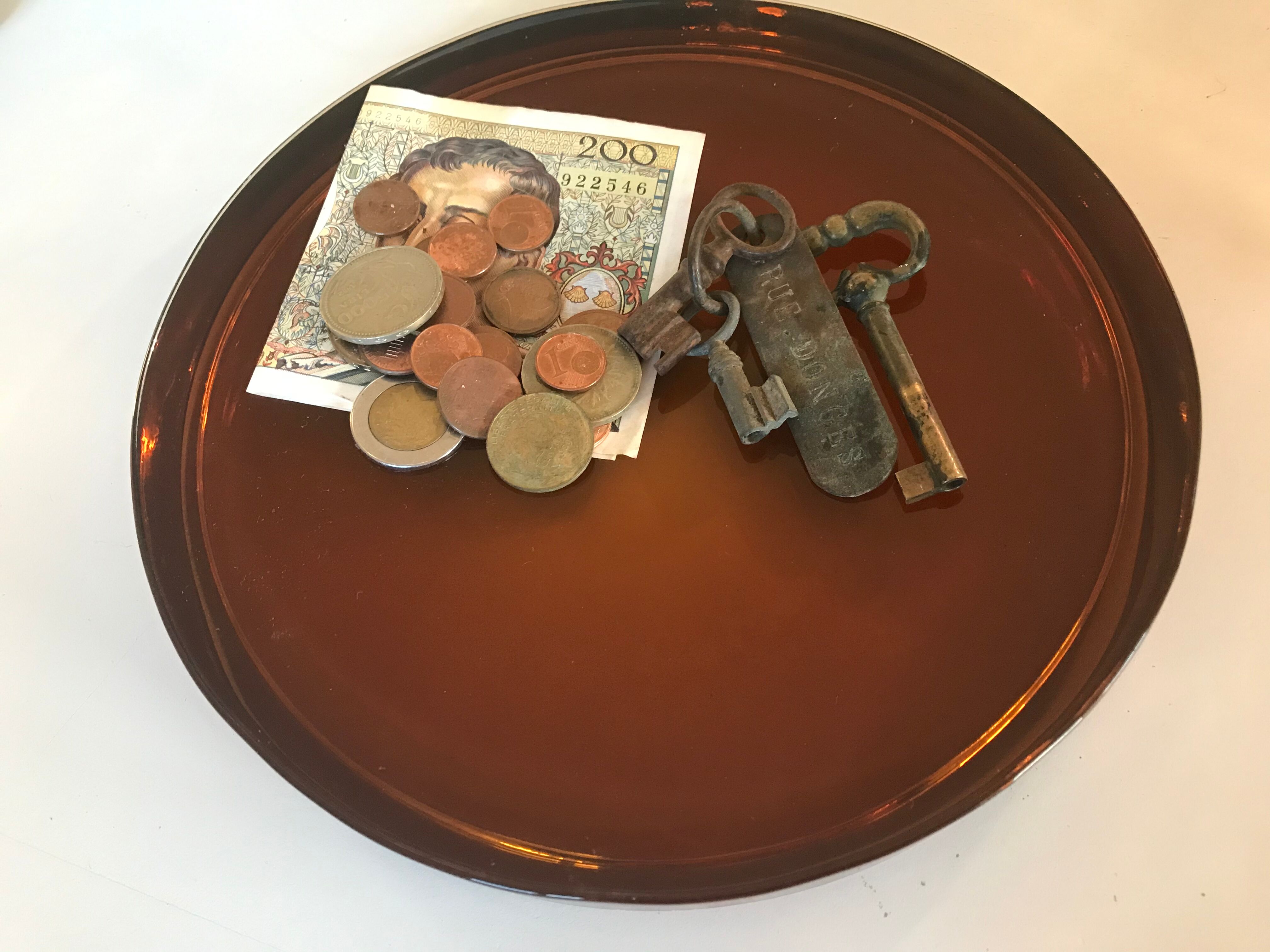 Empty vintage amber glass pocket