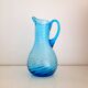 Twisted blue glass jug