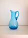 Twisted blue glass jug