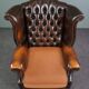 Chesterfield armchair with armrests
