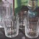 Three Art-Deco crystal whiskey glasses with cut sides