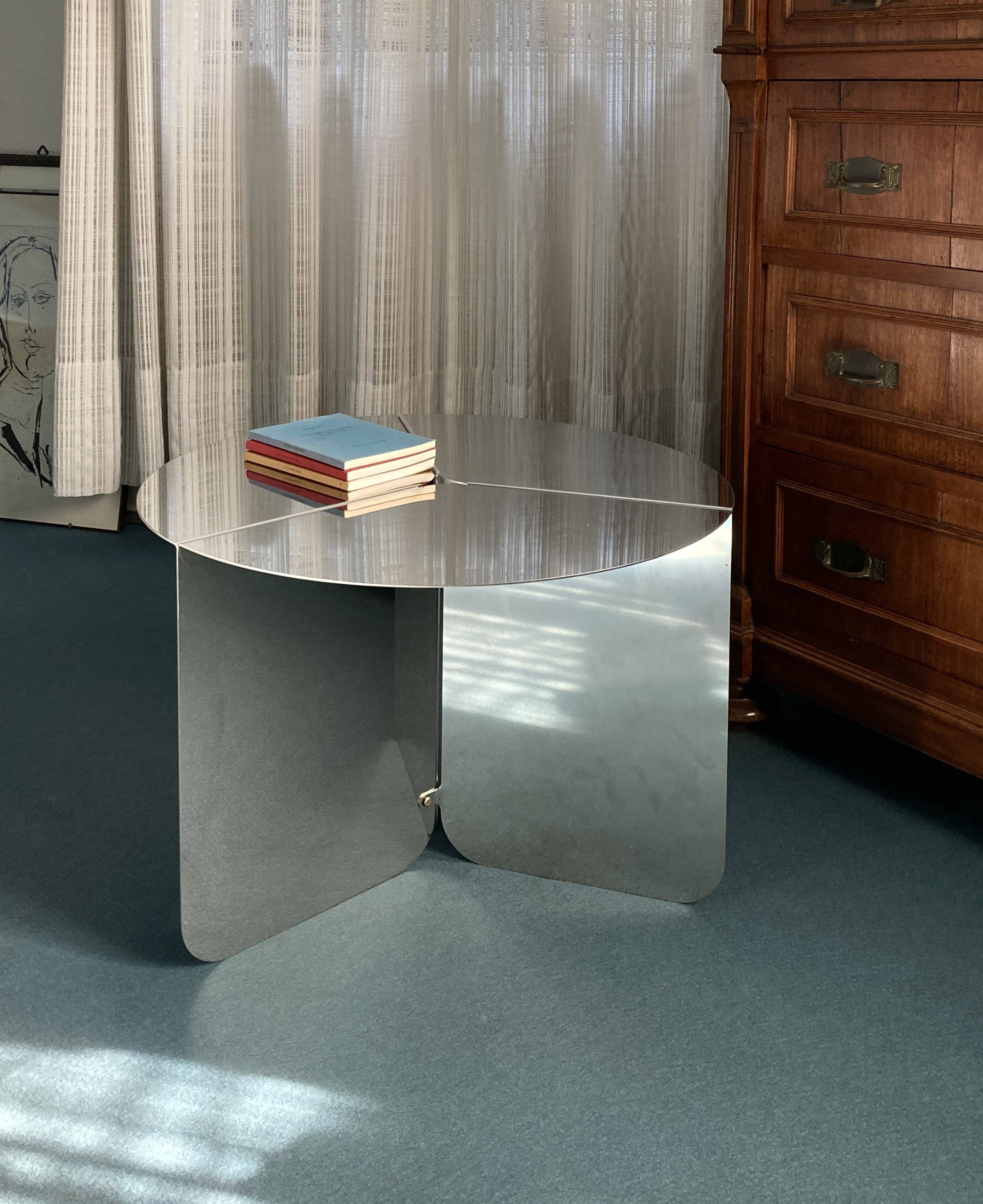 "120" coffee table in stainless steel, minimal design by folding metal