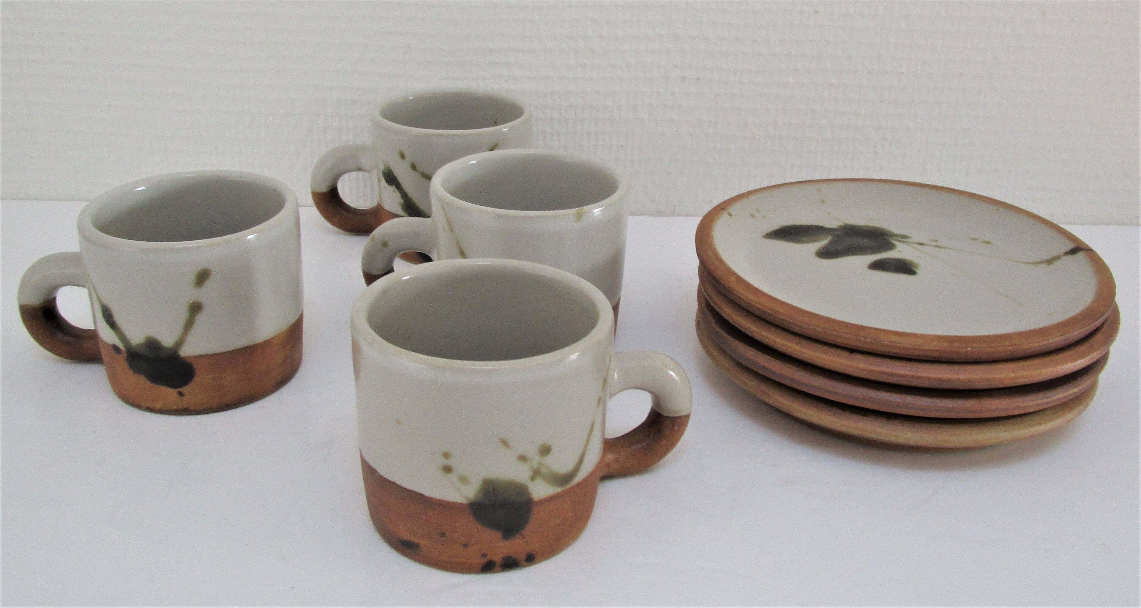 Four pottery cups and saucers from La Colombe Vallauris
