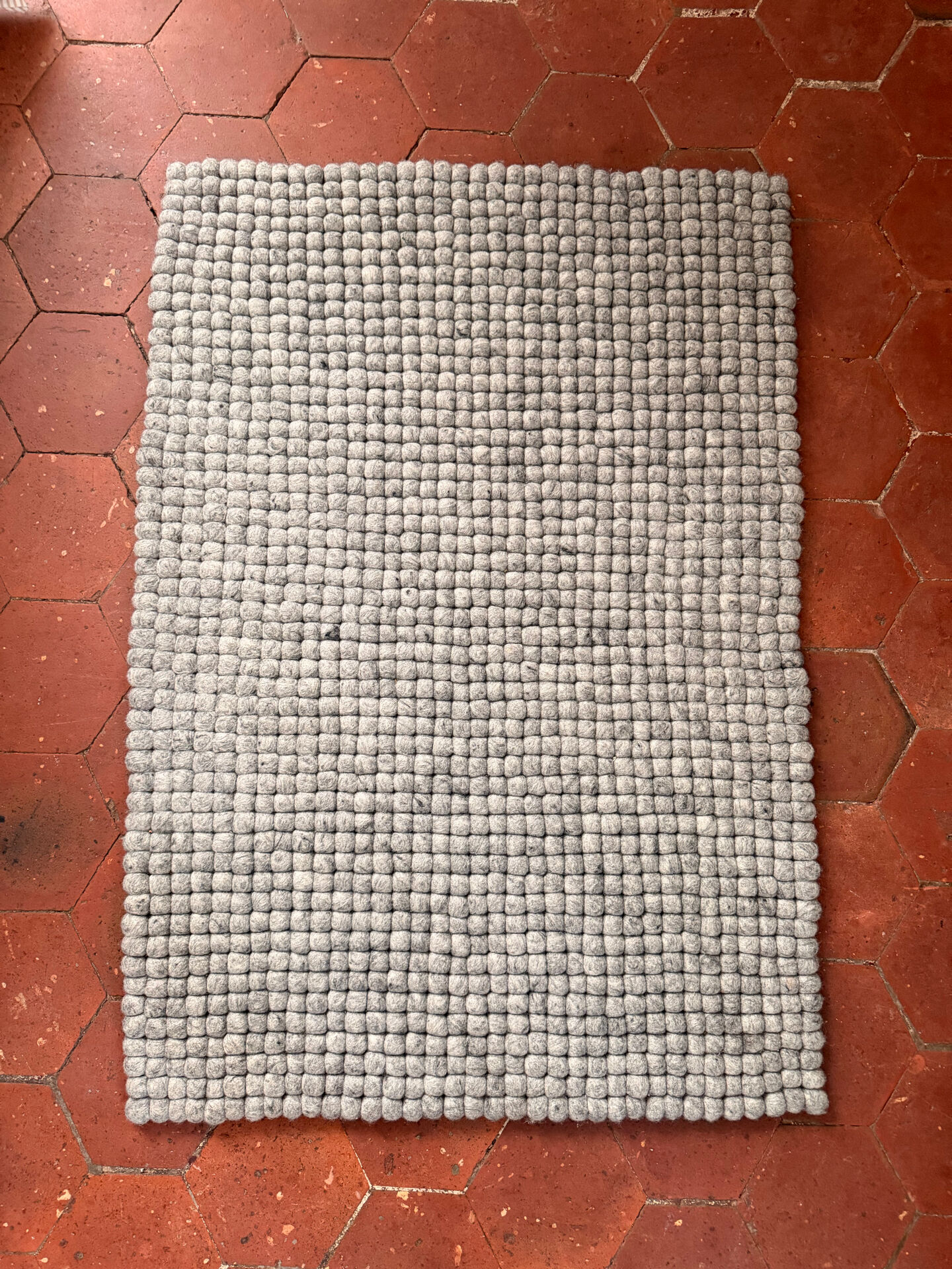 Myfelt rug made of virgin wool felt balls.