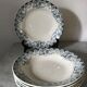 Six hollow plates Terre de Fer