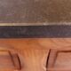 Vanity unit in solid walnut and Zimbabwean granite.