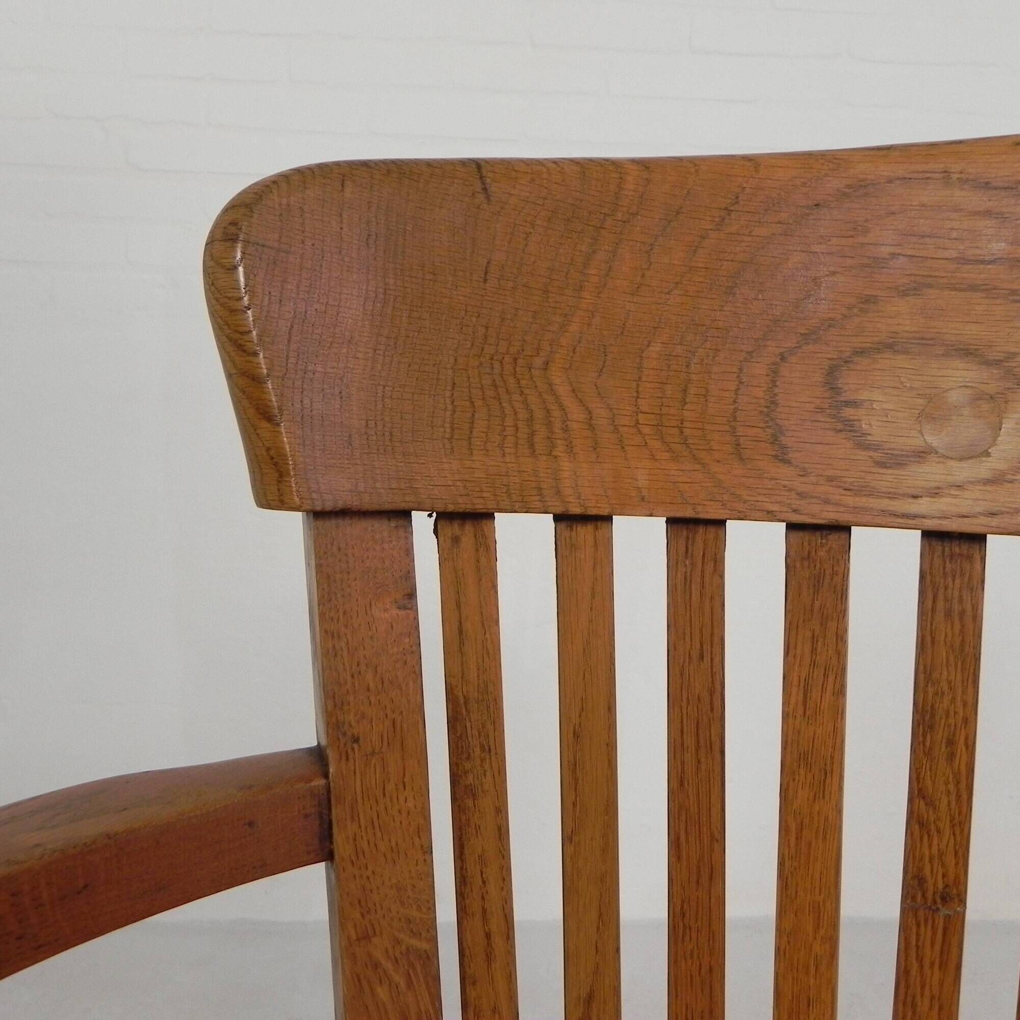 Oak office chair with adjustable spring system and height adjustment, 1950s.