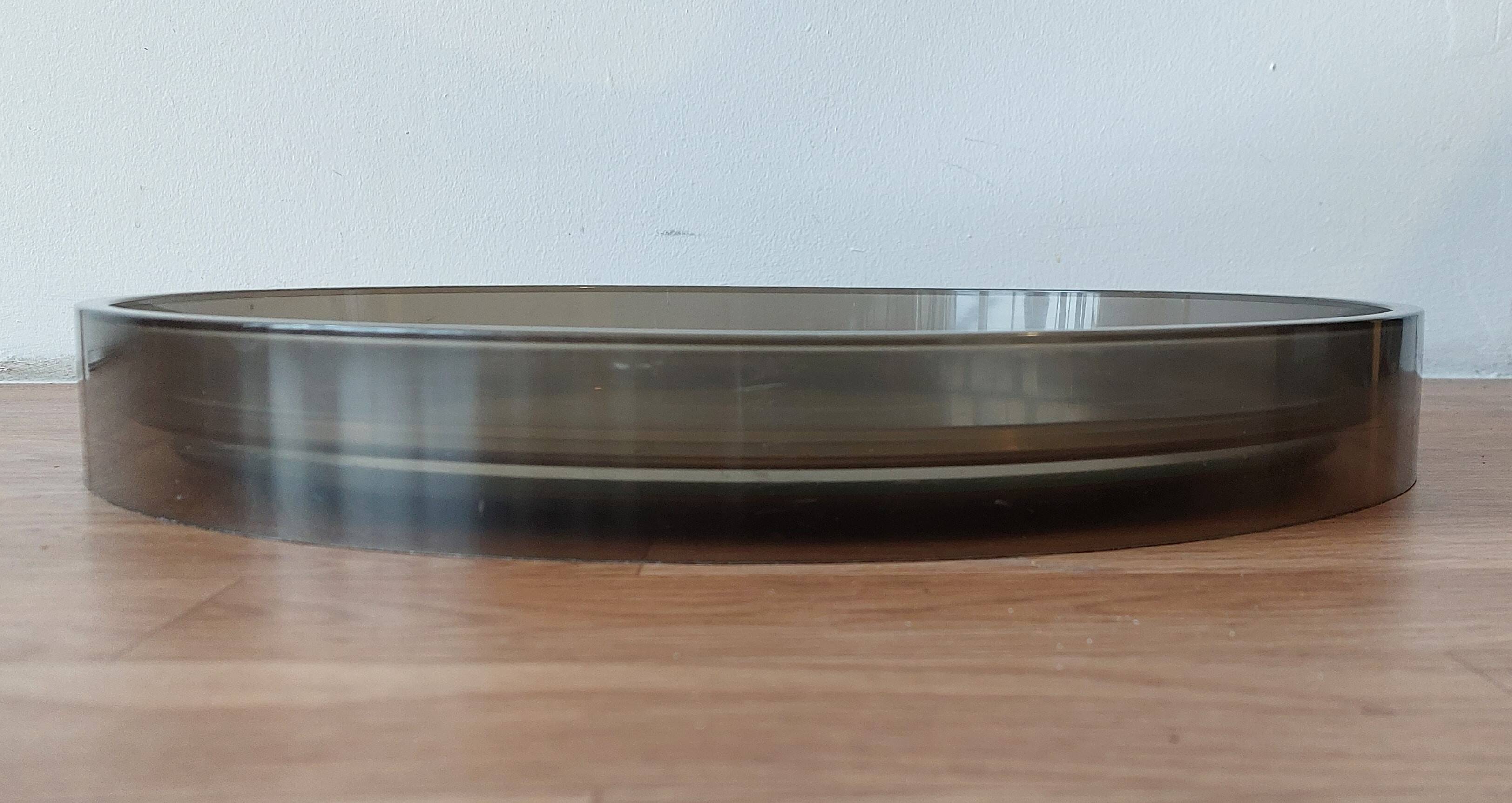 Round smoked plastic mirror 1970 Vintage.