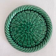 Dessous de bouteille vintage en céramique verte tressée
