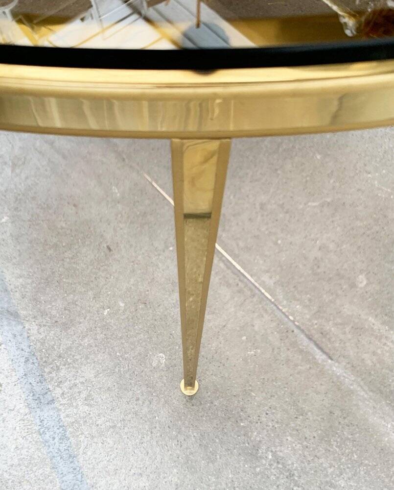 Mid-century Hollywood Regency style coffee table in brass and glass, made in Germany by Vereinigte Werkstätten, 1960s.