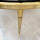 Mid-century Hollywood Regency style coffee table in brass and glass, made in Germany by Vereinigte Werkstätten, 1960s.