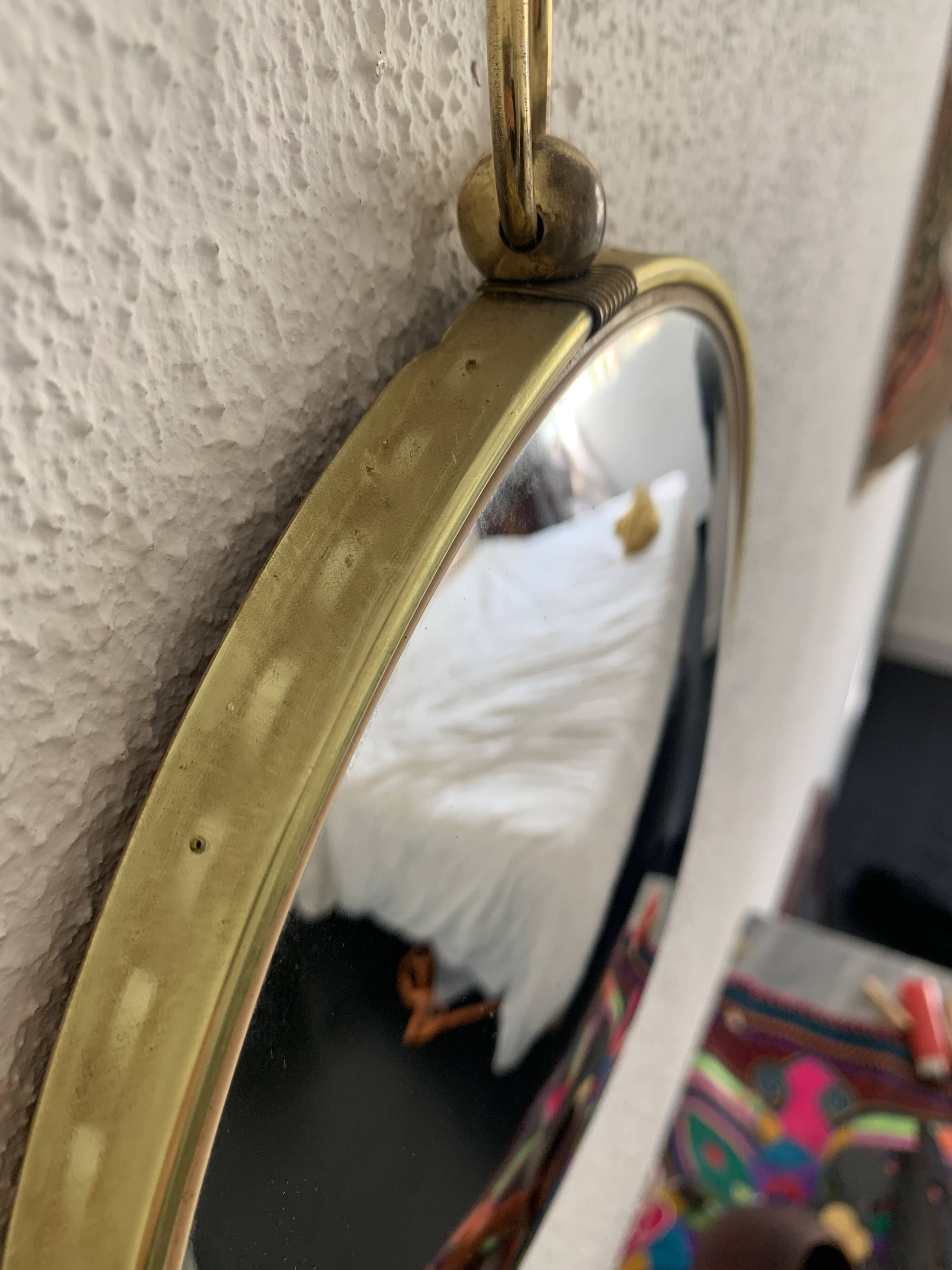 Vintage 1960s witch's eye mirror, turquoise velvet, sunburst effect - 24 x 54 cm