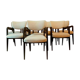 Suite of eight design chairs from the 60s in 10th century blackened wood