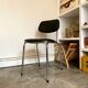 Chaise en aluminium chromé et skaï noir