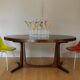 Extendable oval elm table with Baumann extensions