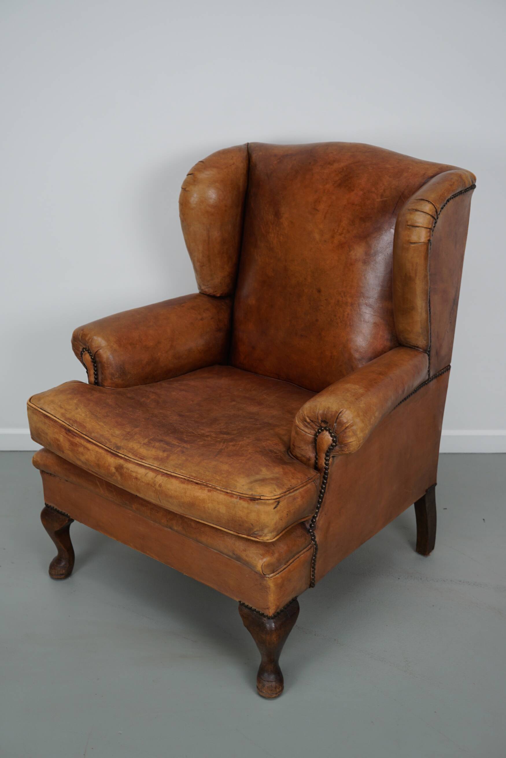 Vintage Dutch cognac coloured leather club chair, with footstool