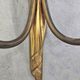 Pair of Louis XVI style bronze wall sconces with bow and tassel, 1940s.