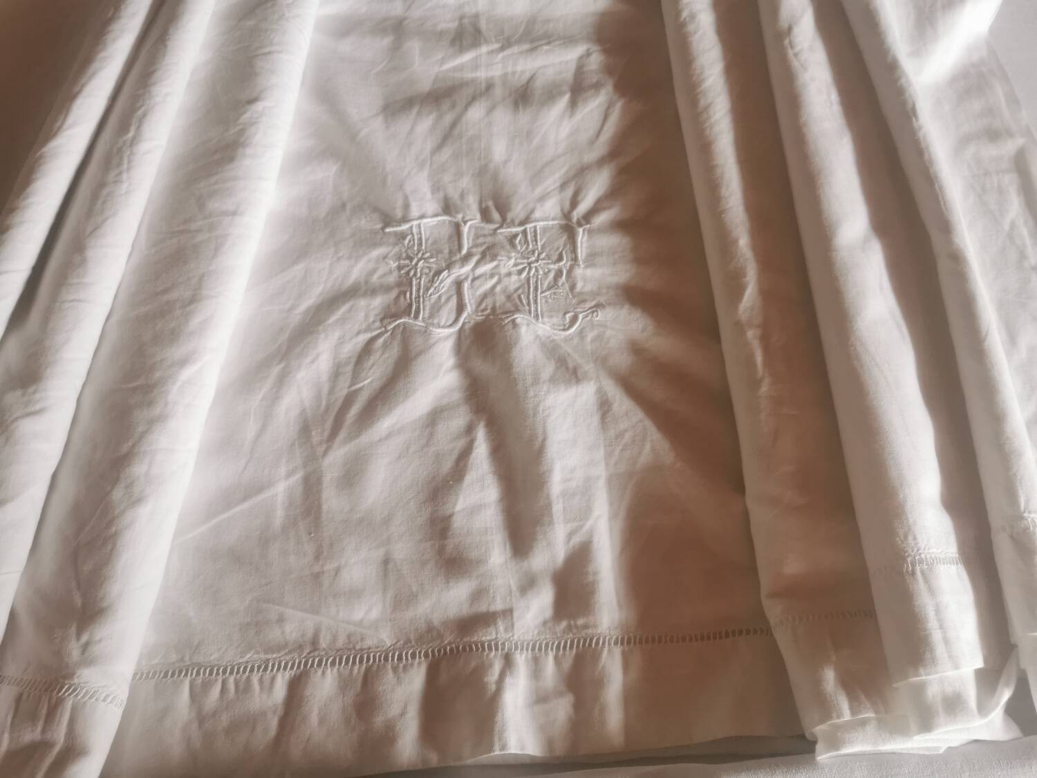 Old large monogrammed sheet hand-embroidered.