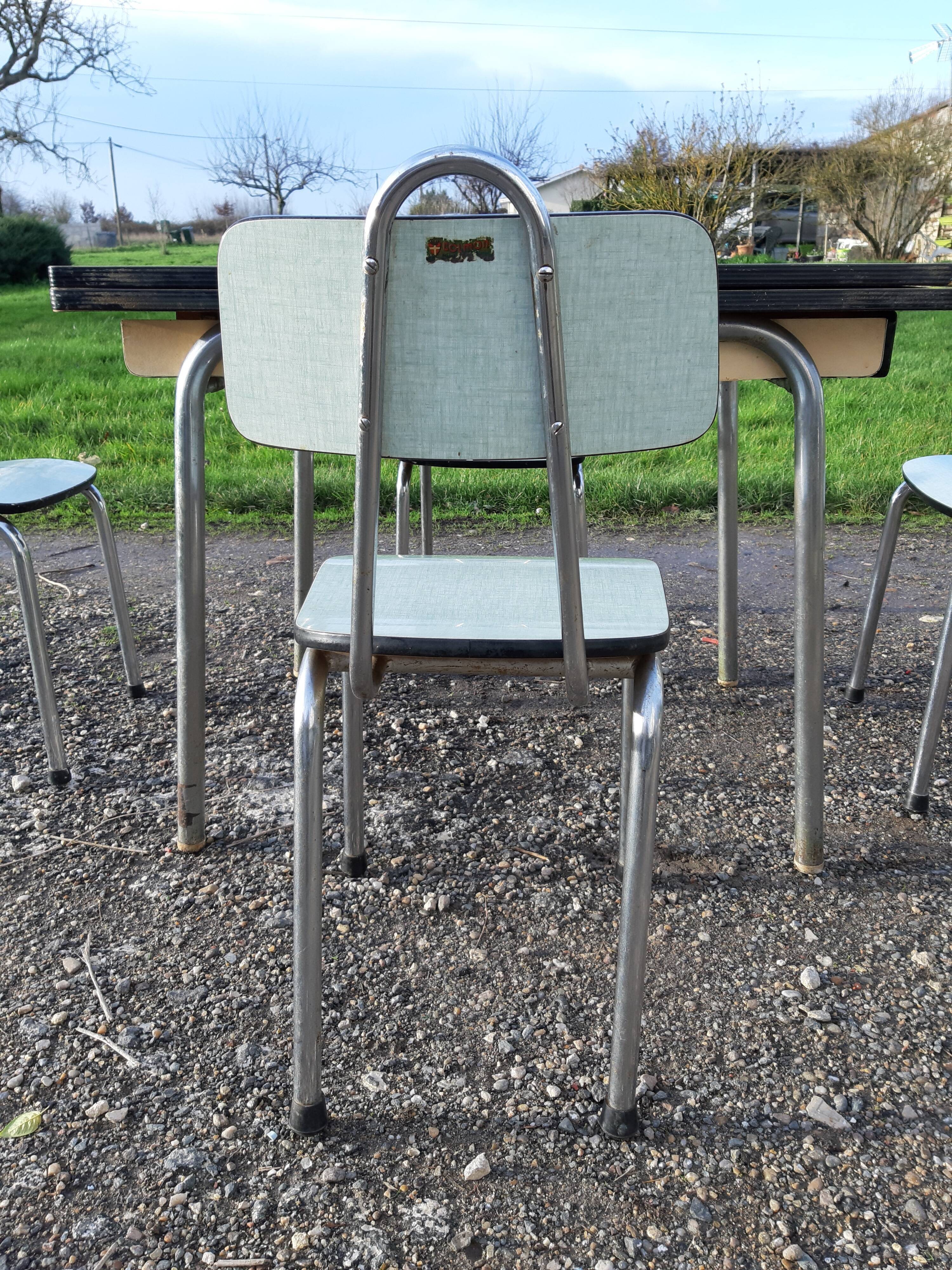 Table et 4 chaises formica vintage de marque Colmon