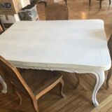 One table table and 8 oak chairs
