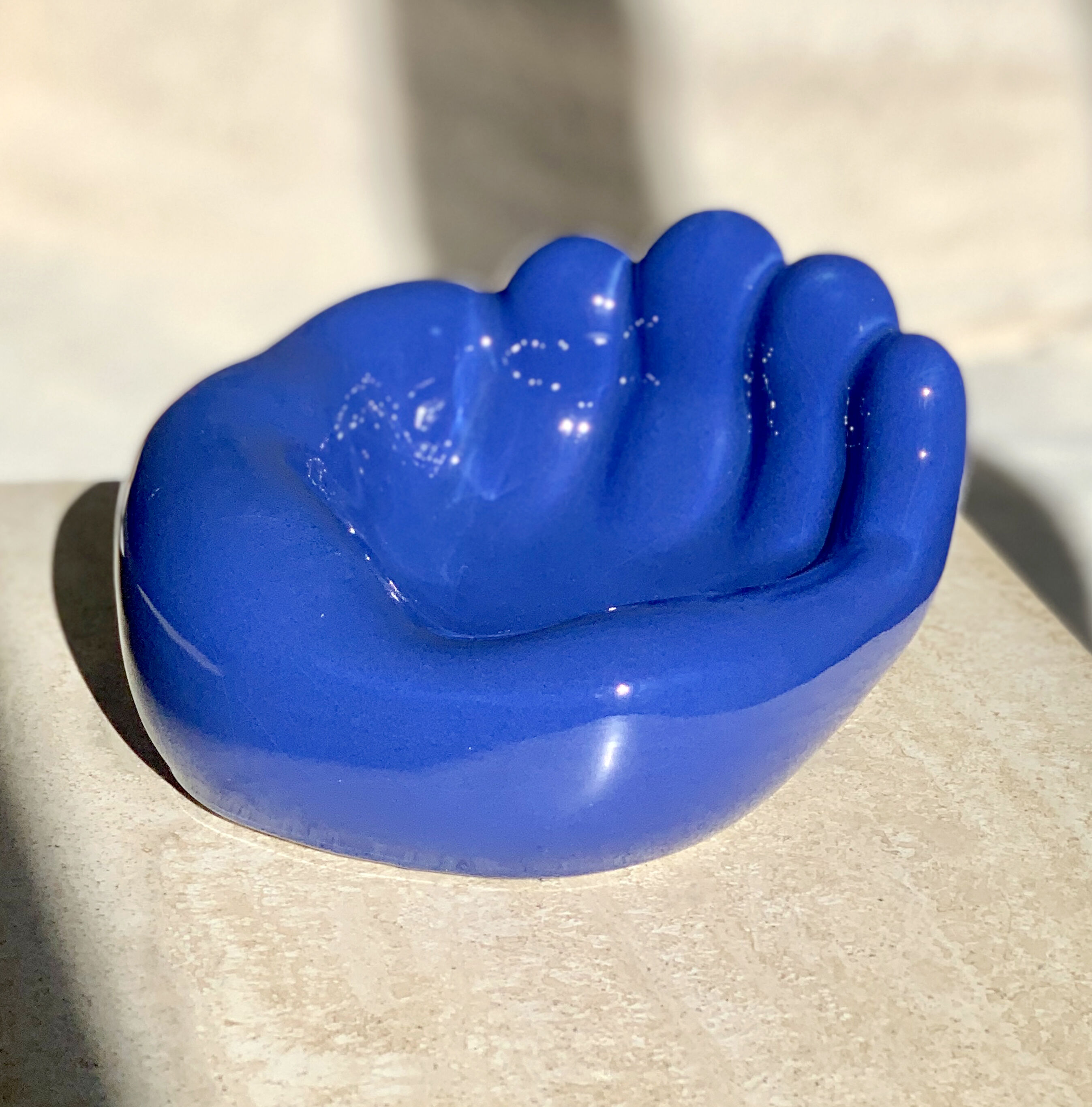 Empty vintage hand-shaped pocket