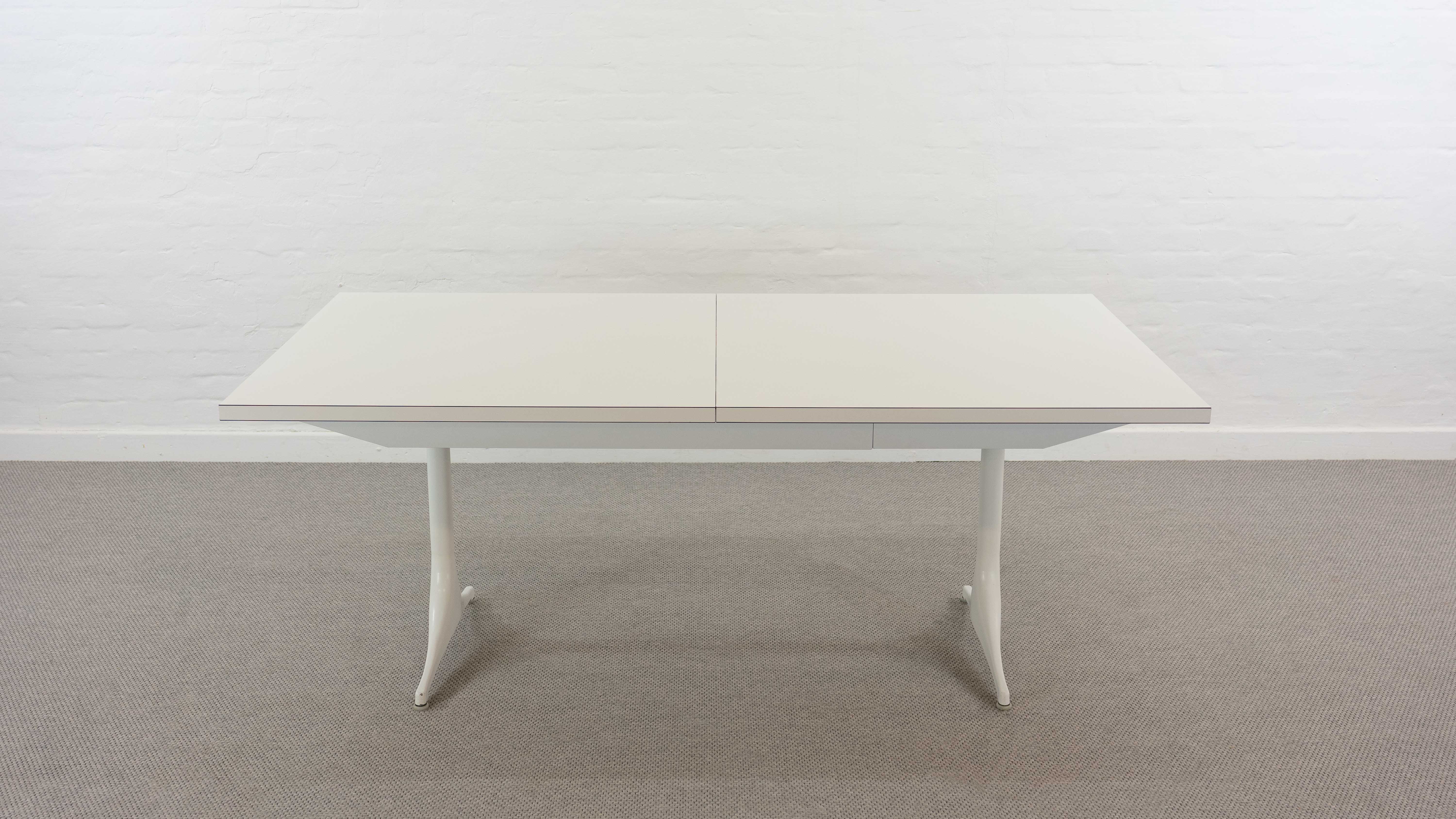 Extendable pedestal dining table by George Nelson for Herman Miller