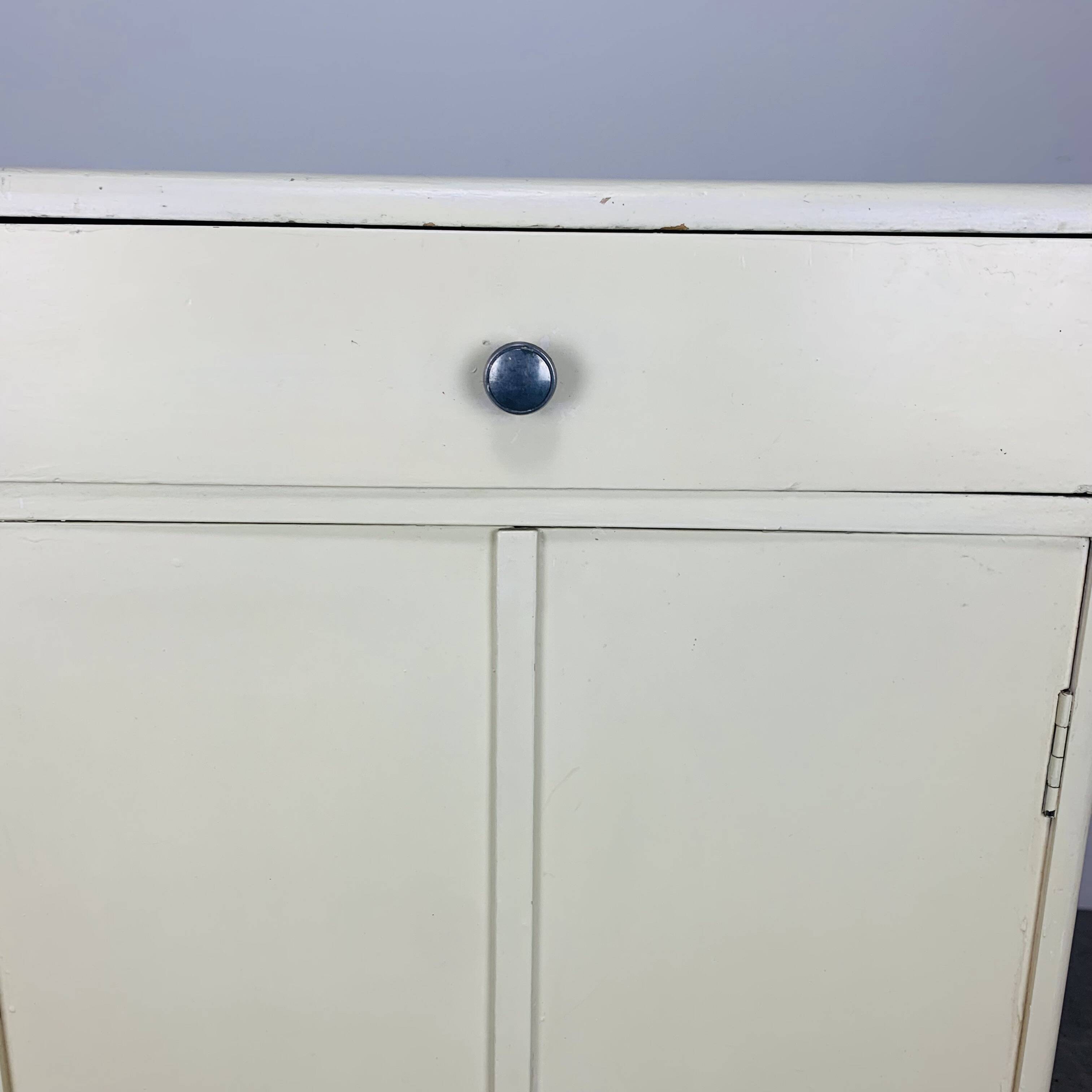 White wood convenient storage unit from the 1950s
