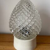 Diamond tip glass wall lamp in the shape of a bread apple.