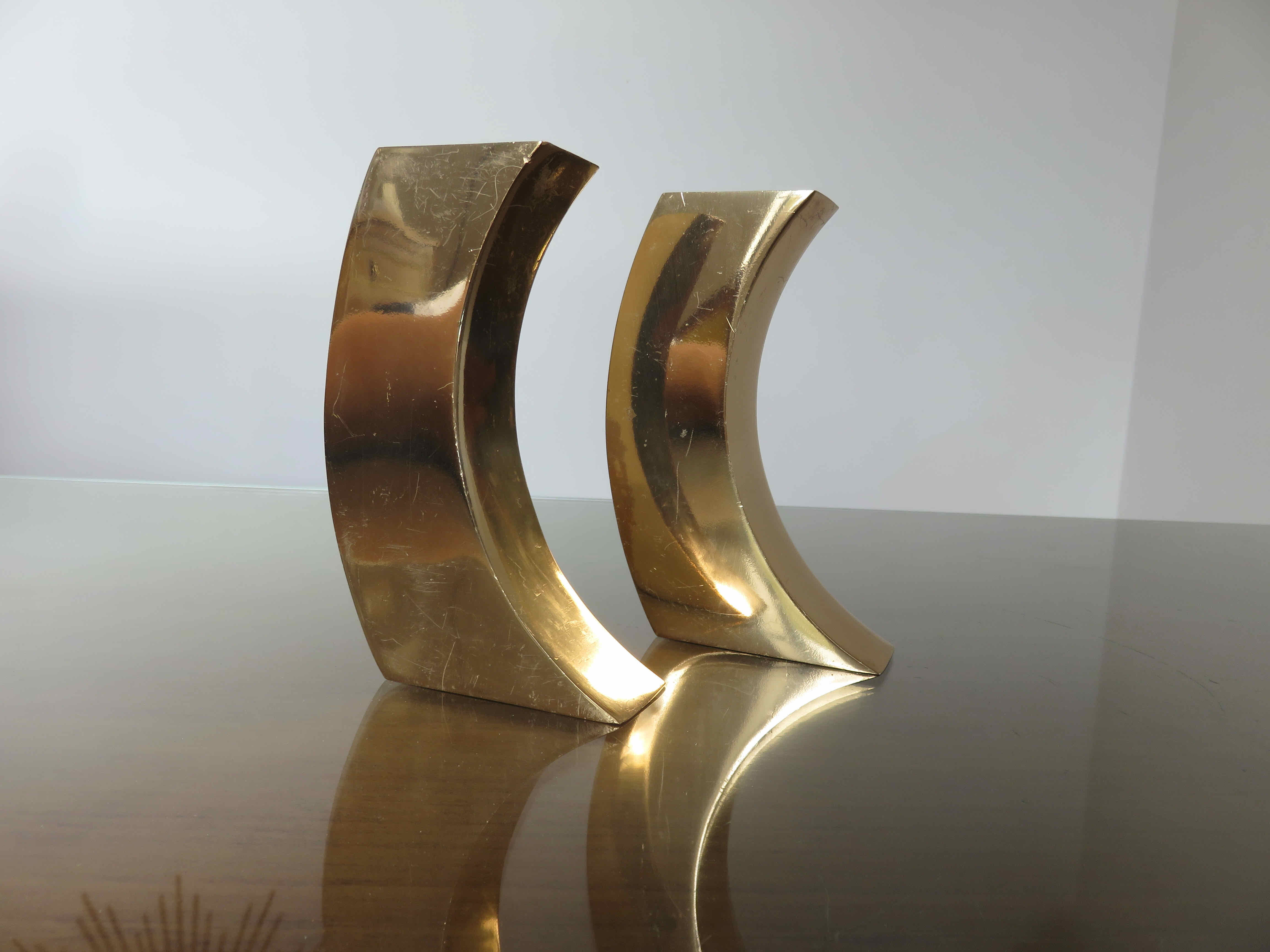 Pair of candle holders in golden brass, 70s