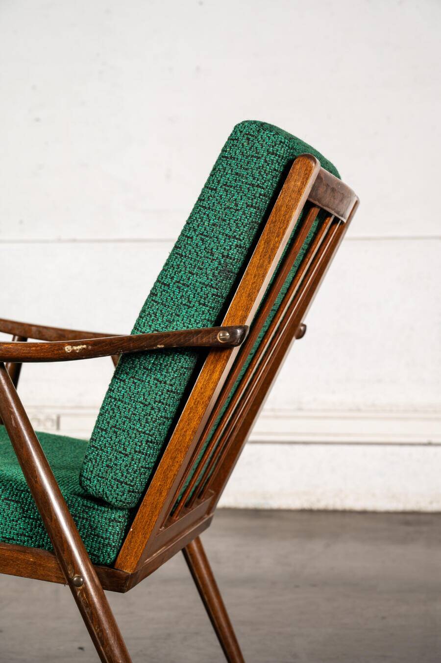 Boomerang chair in green fabric