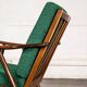 Boomerang chair in green fabric
