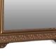 Louis XV style gilded mirror and carved wooden frame