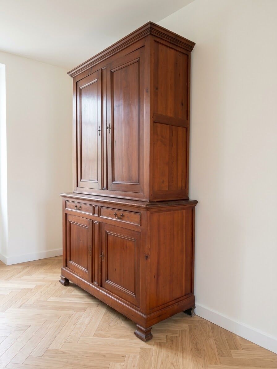 Antique solid wood sideboard with doors and drawers.